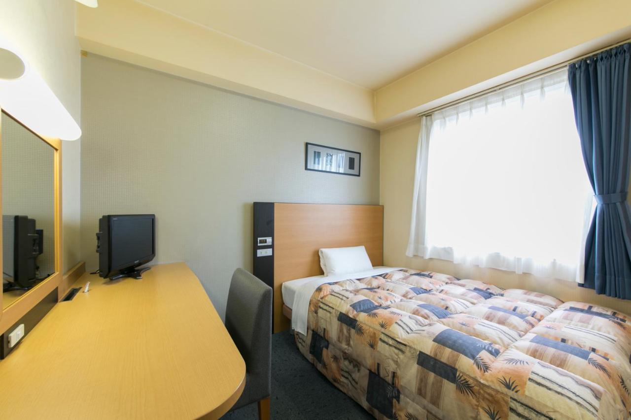 Hotel Econo Taki Esterno foto