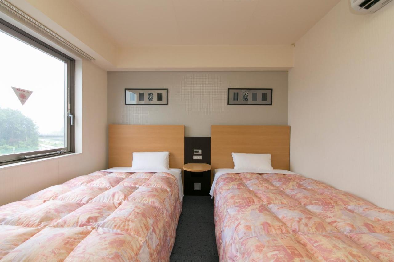 Hotel Econo Taki Esterno foto